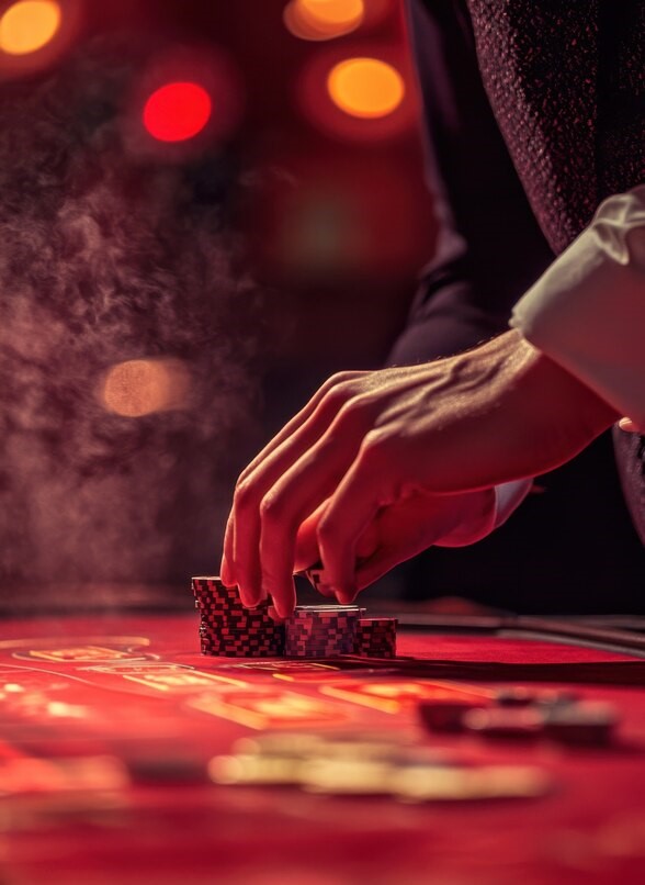 Guests laughing near a roulette pit with low fog effect