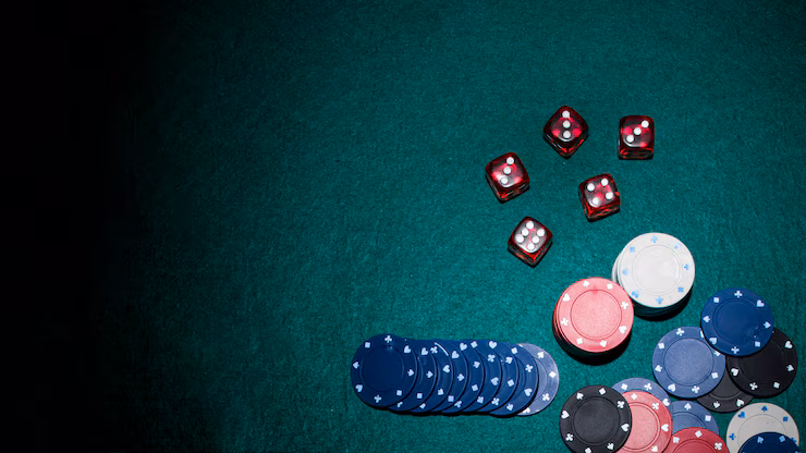Guest raising a glass near a blackjack felt
